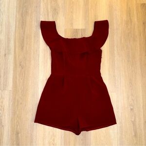 Maroon Romper. Strapless with ruffle lining. open back with tie! Size M.